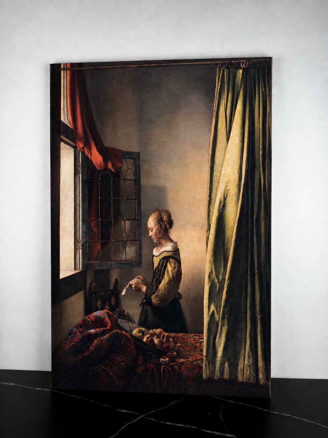 Jeune femme lisant une lettre à la fenêtre – Johannes Vermeer