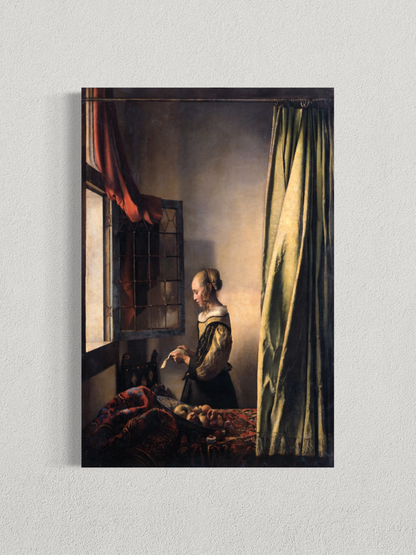 Jeune femme lisant une lettre à la fenêtre – Johannes Vermeer